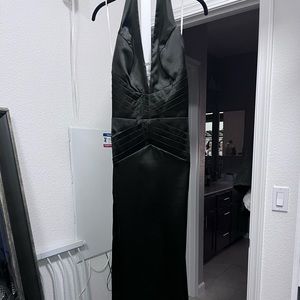 Black halter gown with mini train.